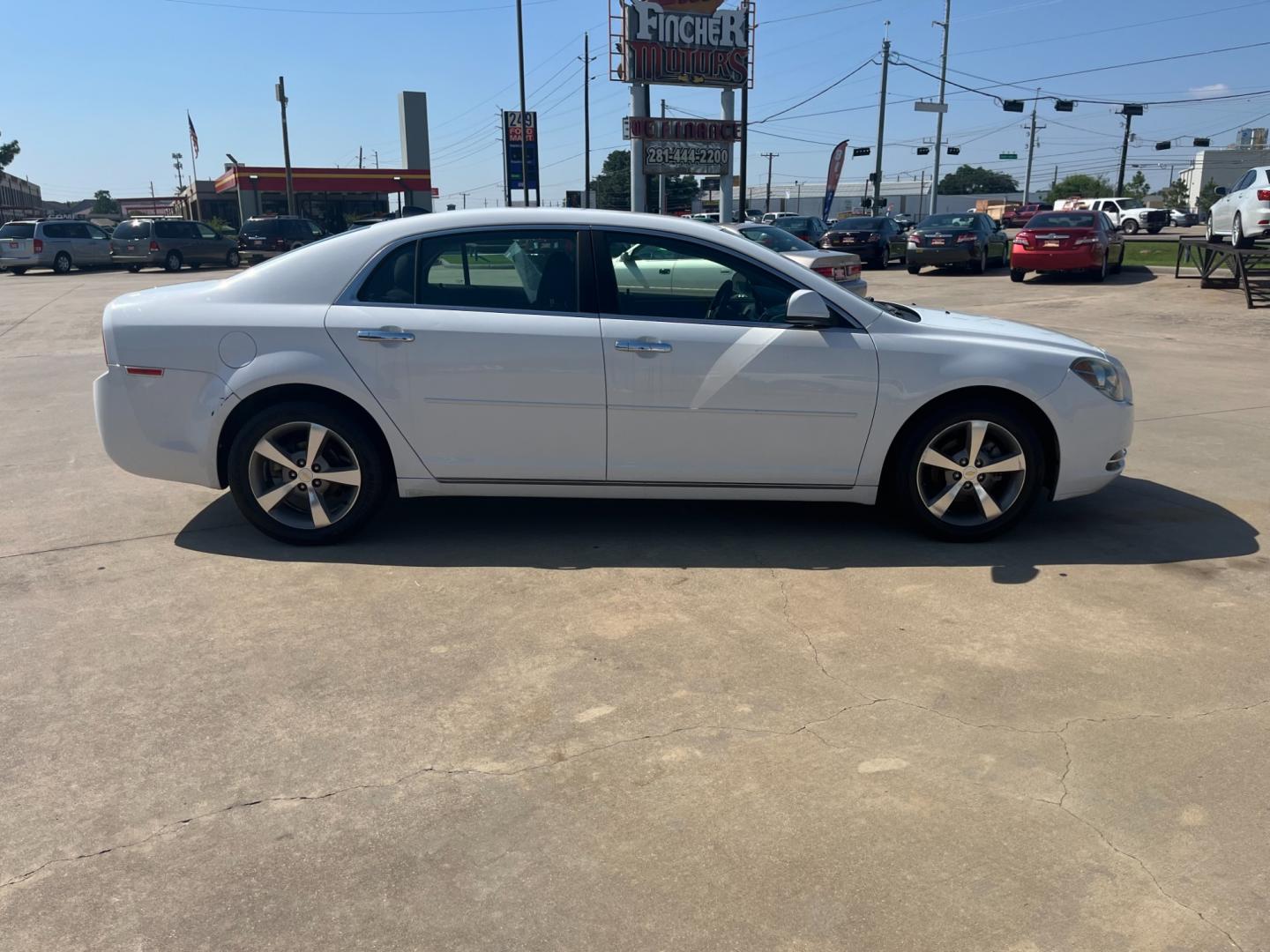 2012 white /black Chevrolet Malibu 1LT (1G1ZC5EU4CF) with an 2.4L L4 DOHC 16V FFV engine, 6-Speed Automatic transmission, located at 14700 Tomball Parkway 249, Houston, TX, 77086, (281) 444-2200, 29.928619, -95.504074 - Photo#7